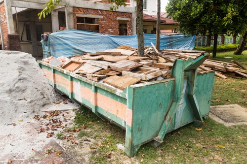 Professional team assessing home clearance needs in Stockwell