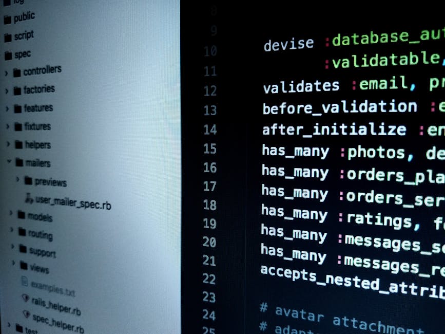 A close-up image of a computer screen displaying a dark background with lines of multicolored code in red, blue, green, purple, and white, with some sections appearing blurred. The code includes HTML 